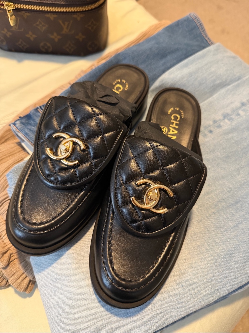 CHANEL Black Quilted Leather Slip-On Loafers with Gold CC Emblem